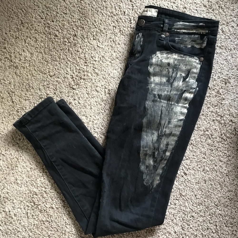 Gold paint smeared skinny jeans